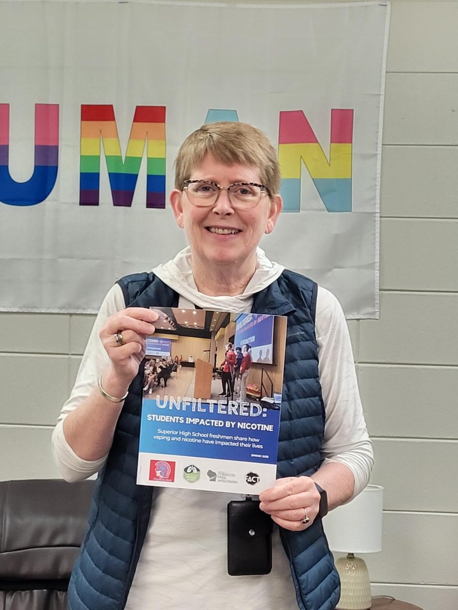 Social Worker Jane Larson holds a copy of "Unfiltered: Students Impacted by Nicotine” during advisory on Oct. 16, 2025. Larson has worked on nicotine prevention for students in the past, such as with her NOT (Not On Tobacco) program.
