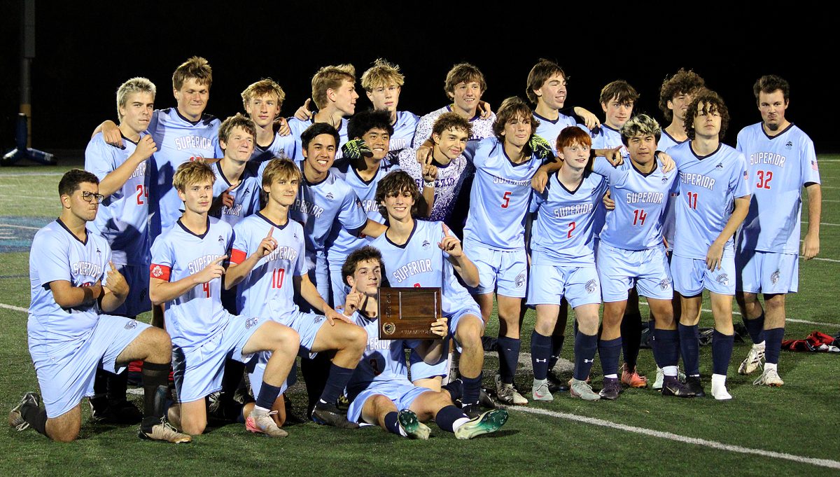 The Superior Spartans Boy’s Soccer team poses with the LSC Conference Champions plaque after a 6-0 win on Oct. 6, 2025. The Spartans were awarded the trophy in the game following their 5-1 win over Proctor that would seal Superior as conference champions.