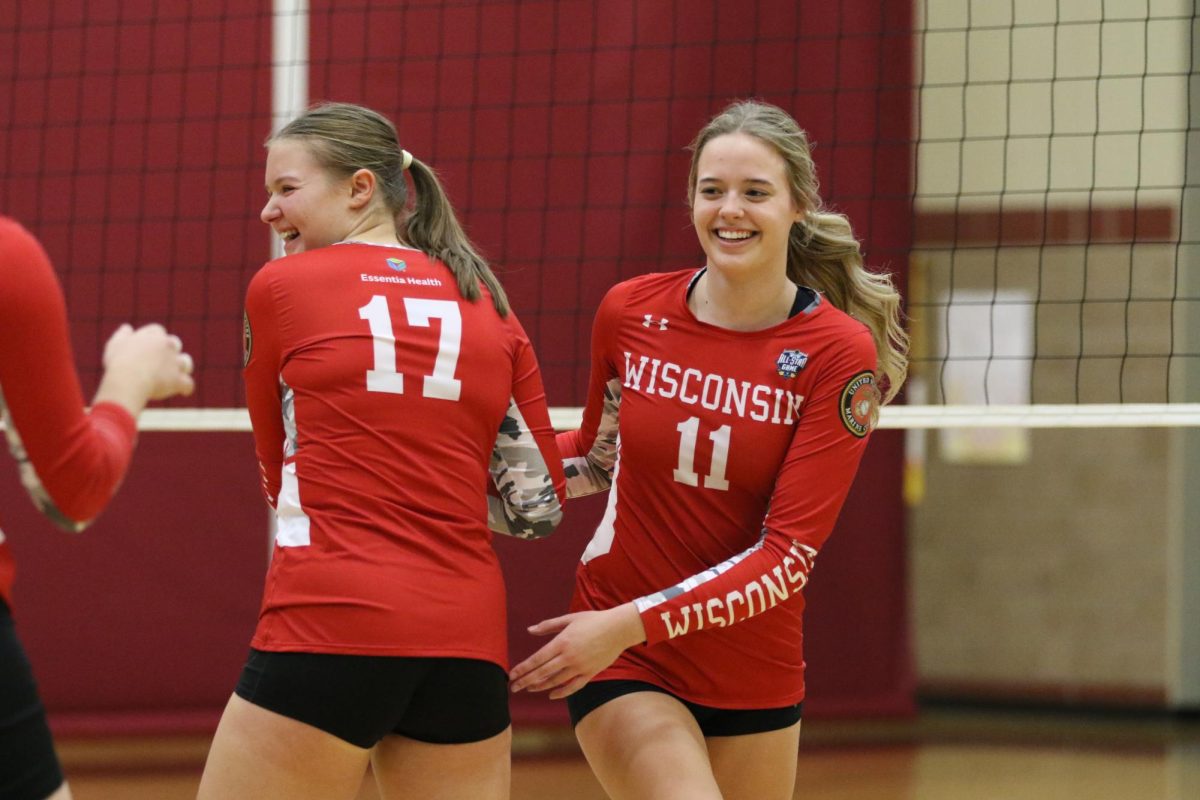 Seniors Claire Egnash (11) and Anna Matthias (17) substitute during the 2025 Essentia Health High School All-Star Volleyball Game on Nov 11. Egnash and Matthias were selected for the Wisconsin team following their high school seasons.