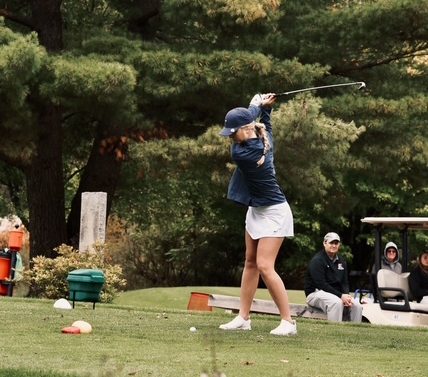 Senior Ellie Olson tees off on a par three at Stevens Point golf course at Sectionals meet on Oct. 6. 