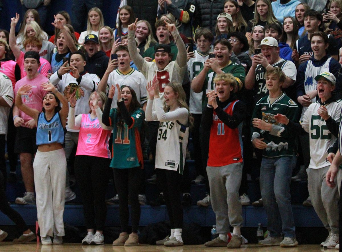 The Superior student section erupts after Calvin Anderson finishes his layup to break the school all time scoring record on Dec. 16. 
