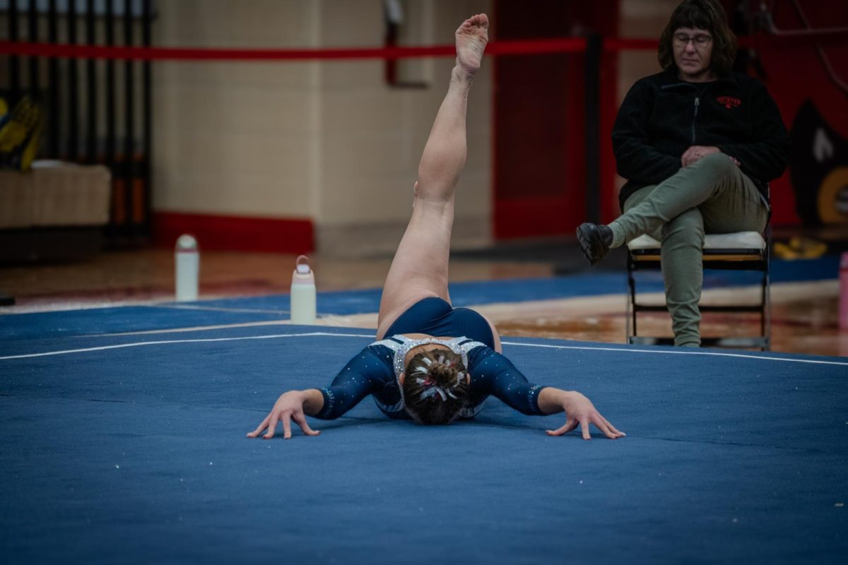 Senior Addison Matushak poses during her floor routine at a meet on Dec. 8th 2025.