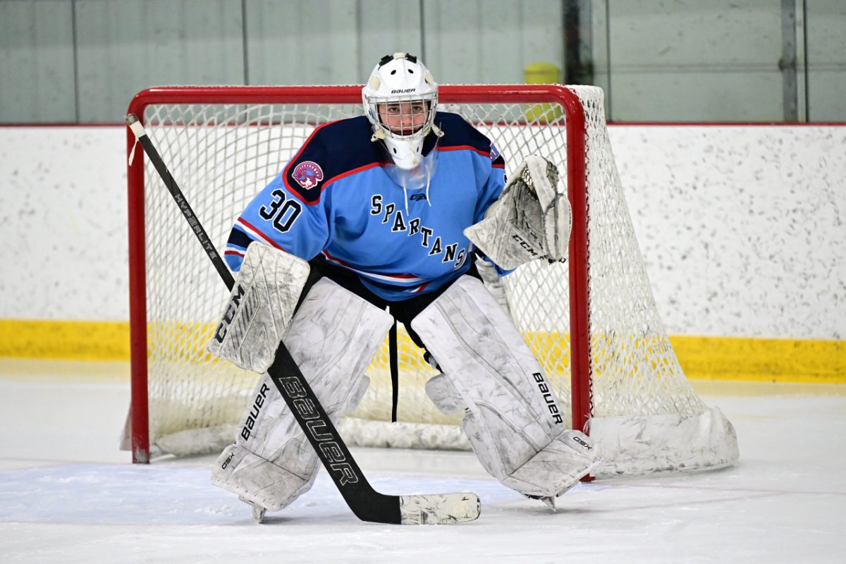  Junior Ava Dahl eyes the puck in a JV hockey game against St. Croix Valley Fusion on Jan. 31, 2026. ( Submitted by Tom Krob)