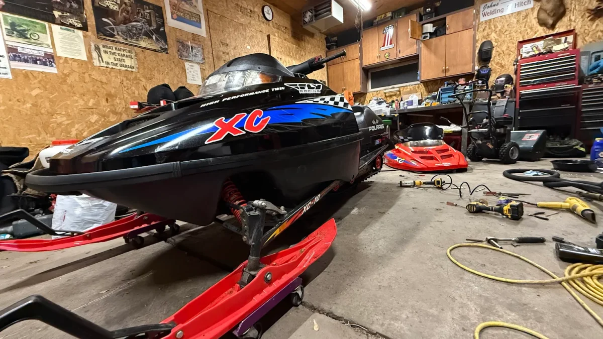 Senior Gabe Killian’s snowmobile sits in his garage after installing a new hood on Dec. 10.