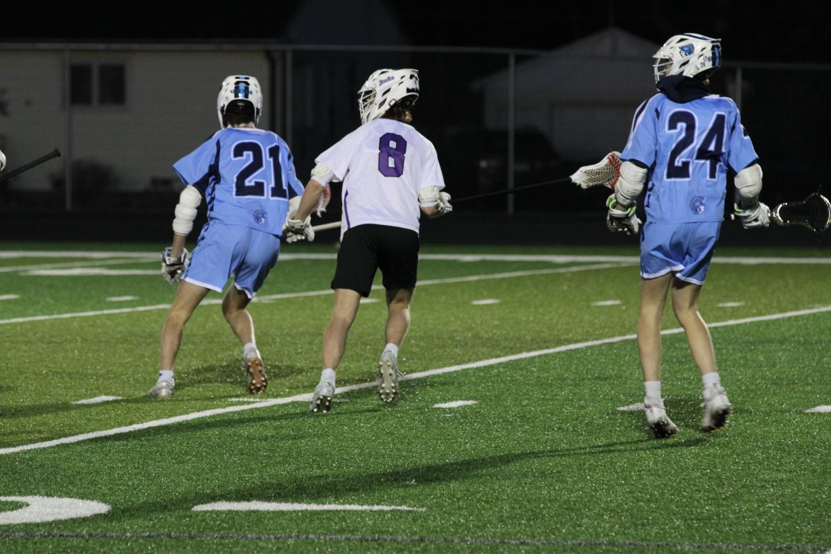 Sophomores Henry Haugen and Tucker Tepsa prepare as the ball comes down the field on April 21 at Cloquet.