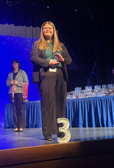 DECA president qualifies for state, leads members to diamond status