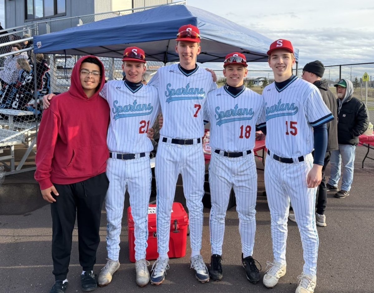 Seniors (left)  Ezekiel Simiyu, Samuel Hubbard, Dawson Ahlborg, Jayce Rue and Austin Edwards (right) pose for a photo after the ALS charity game on April 30, 2026. 