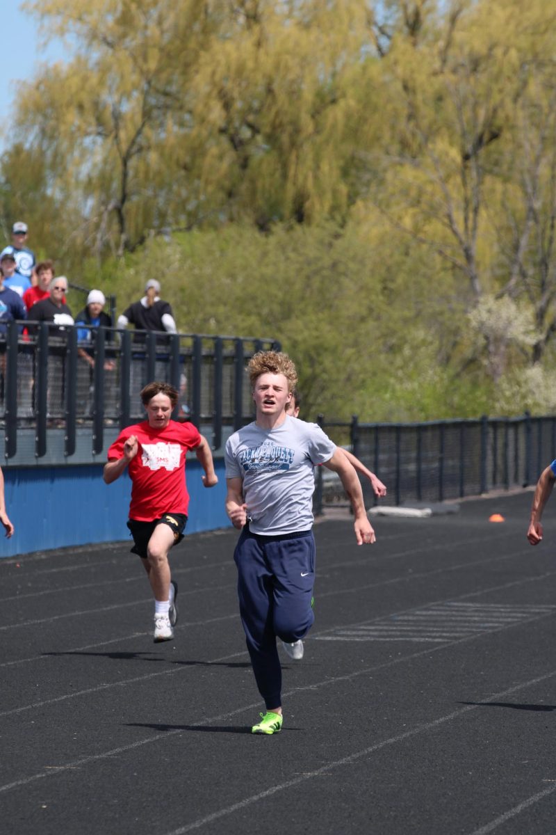 Senior Aiden Parks takes the lead in the boys 100 meter dash during the eighth grade Track-O-Rama on June 1 at the NBC Spartan Sports Complex. 
